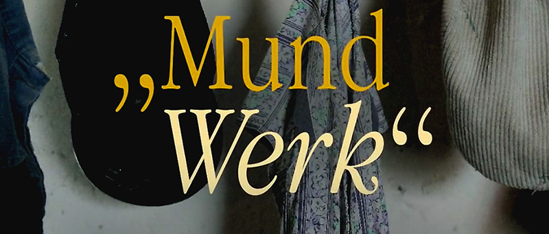 Schriftzug Mund Werk